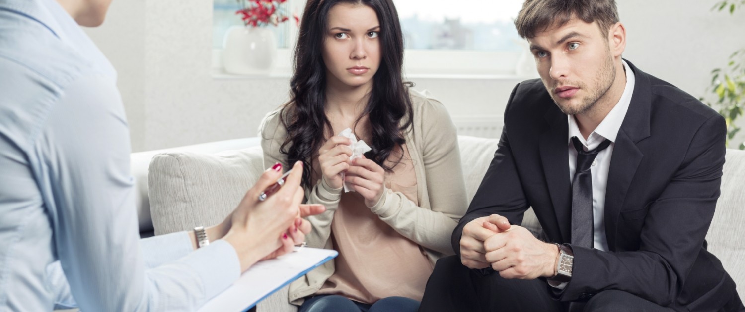 Young couple with a problem to consult a psychologist